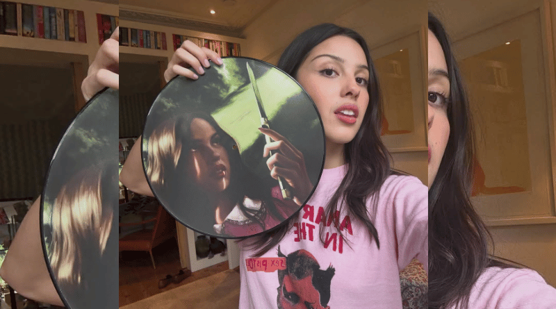 Olivia Rodrigo holding Carve Our Names vinyl artwork