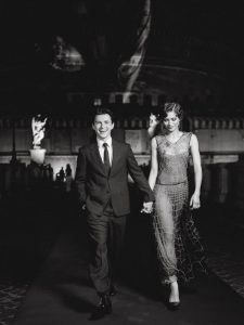 Tom Holland and Zendaya walking together in Rome during the Spider-Man Brand New Day promotional tour.